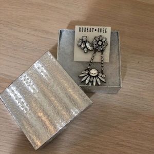 asymmetrical earrings